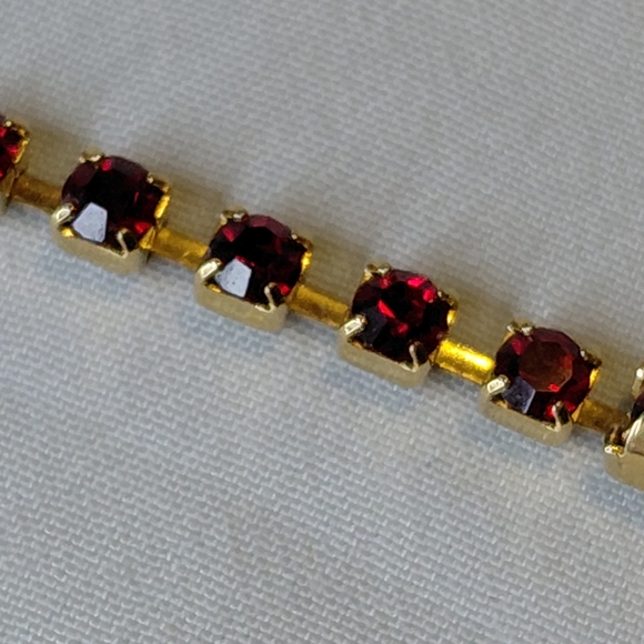 Avon Jewelry - Avon Gold and Red Gemstone Bracelet